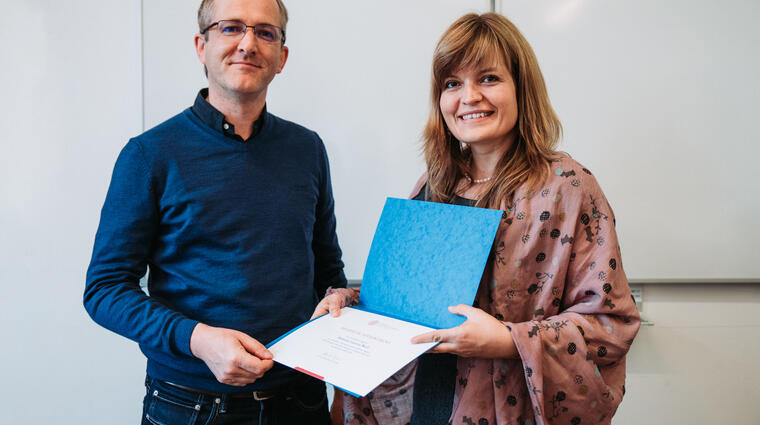 prof. Laurent Weill (University of Strasbourg); děkanka FSV UK dr. Alice Němcová Tejkalová