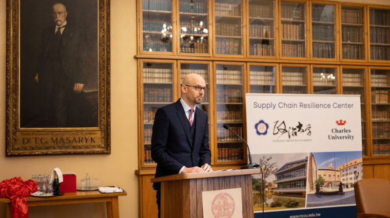 a man standing at a lectern