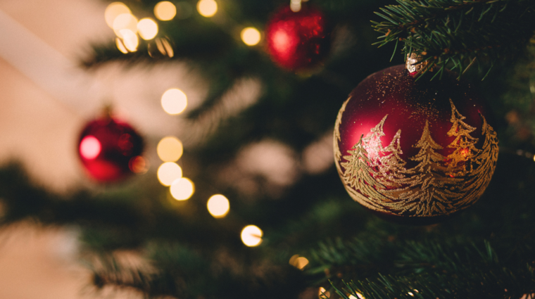 christmas tree with red ornaments in detail