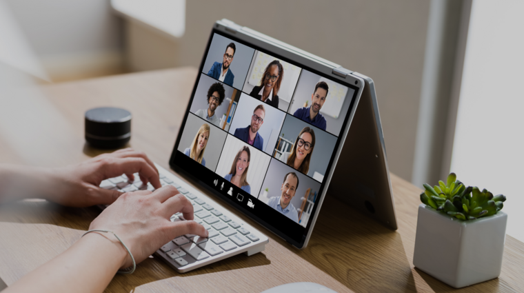 a tablet with an online call with nine people
