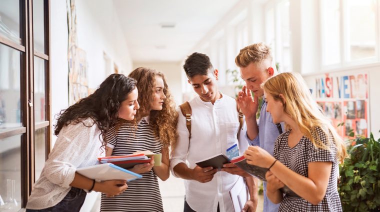 students debating in a corridor